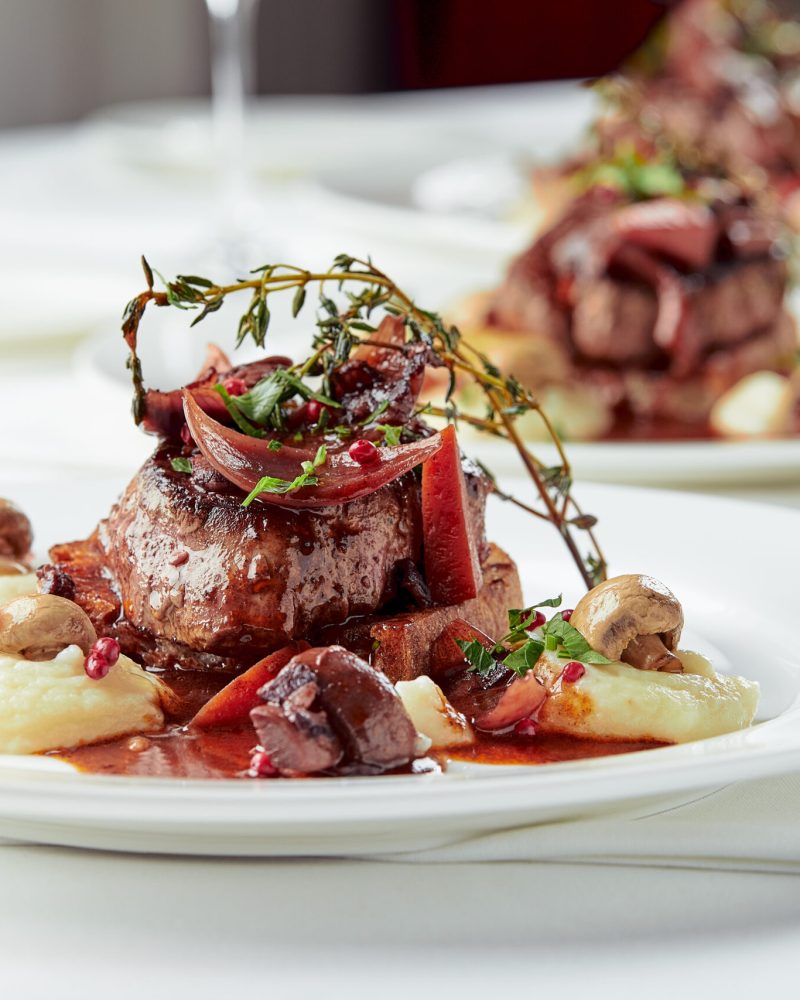 Gourmet appetizer: Beautifully decorated catering banquet foie gras with berries.